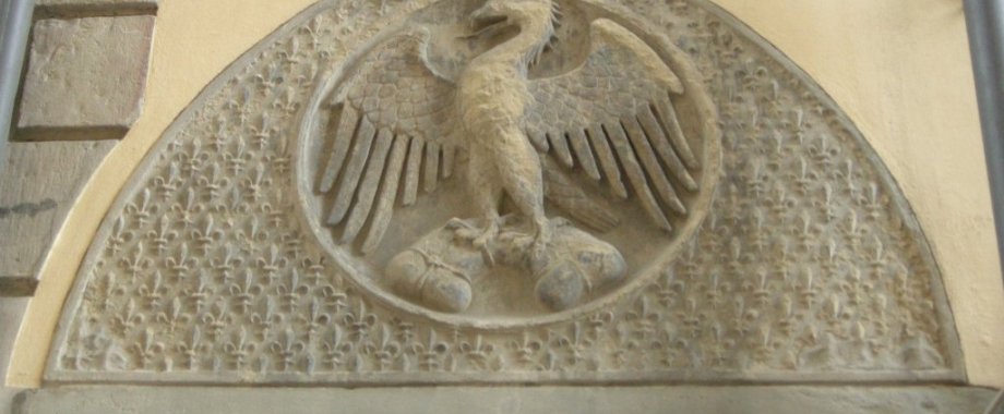 2gc9p1wfnv_Via_de__calzaiuoli__palazzo_dell_arte_dei_mercatanti__grande_stemma_dell_arte_di_calimala